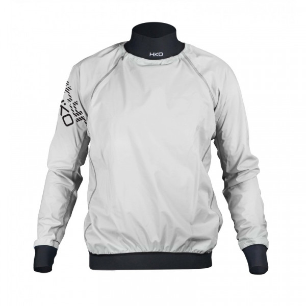 White lightweight paddle jacket with waterproof material and elastic waistband for protection while kayaking.