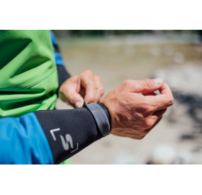 Dry suit for whitewater with waterproof material, latex cuffs, and reinforced areas for kayaking.