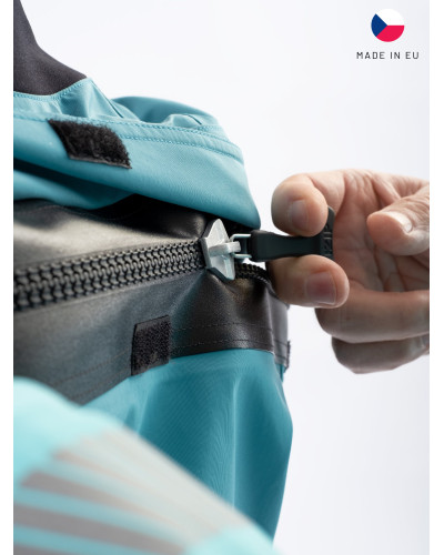 Blue dry suit for whitewater with waterproof material and reinforced areas for kayaking.