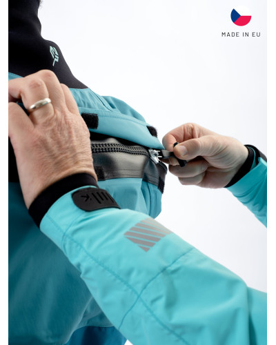 Blue dry suit for whitewater with waterproof material and reinforced areas for kayaking.