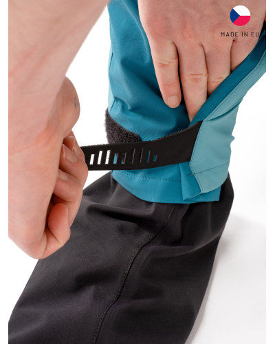 Blue dry suit for whitewater with waterproof material and reinforced areas for kayaking.