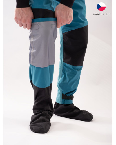 Blue dry suit for whitewater with waterproof material and reinforced areas for kayaking.